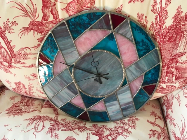 Orologio con quadrante in vetri diversi piombati