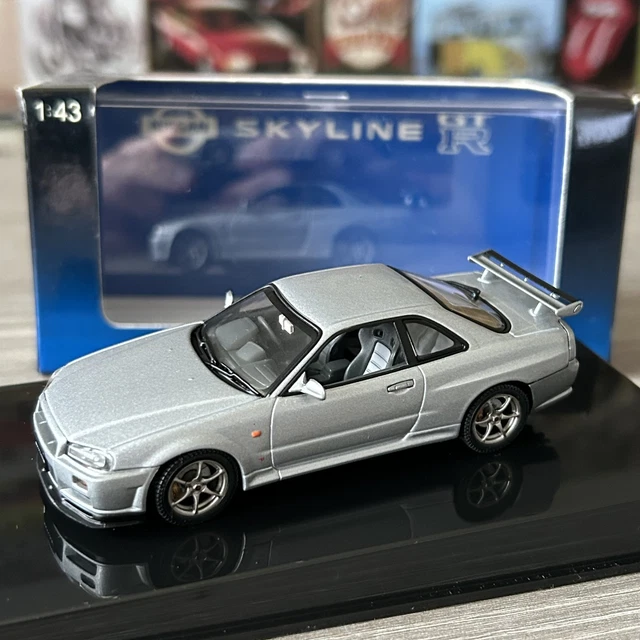 Nissan Skyline R34 GTR V-Spec II Miniature AutoART 1/43 - Noire Pearl 1994