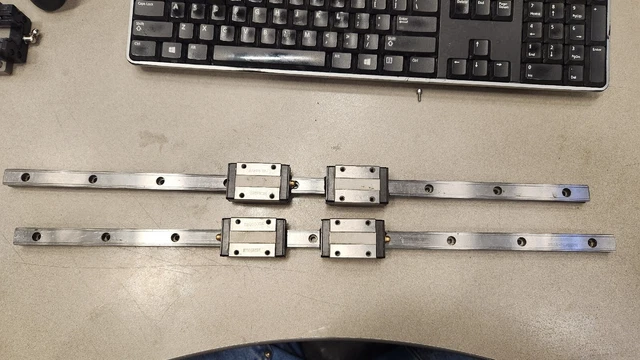 2 520mm 15mm THK Linear Rail + Four THK SR15 Linear Guide Bearing Blocks. Used