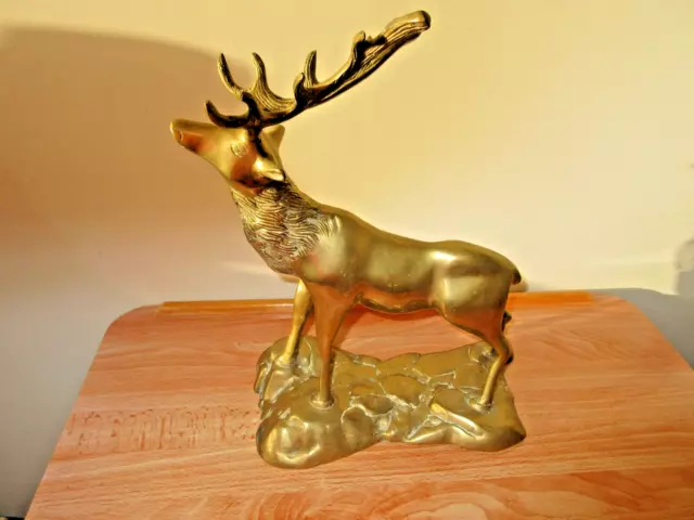 VINTAGE SOLID  BRASS LARGE STAG on a brass plinth weighs 2.5kg - 34cm tall