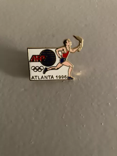 pin's.PINS.JEUX OLYMPIQUES.AFP.MEDIA.ATLANTA 1996.EGF.SIGNE A.B.