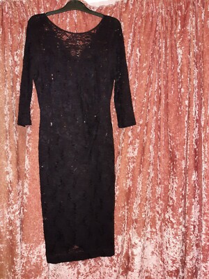 Classic little black dress in lace with sequins. Size 12. Worn Once.