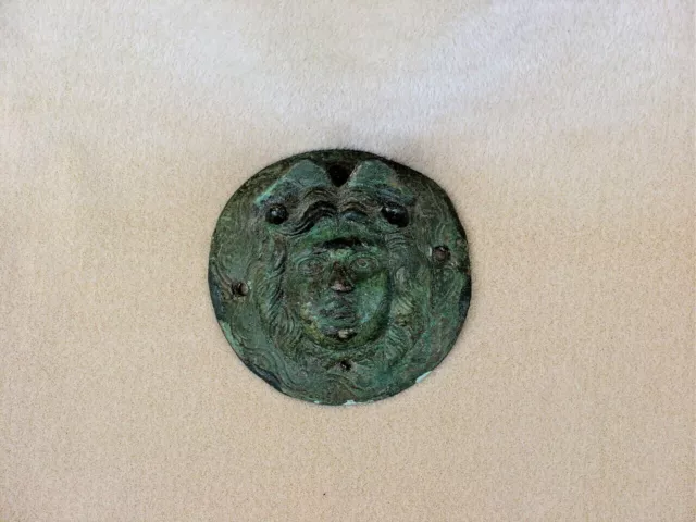 Ancient Bronze Roman Phalera Shield Boss cover as a Medusa or Nemesis head