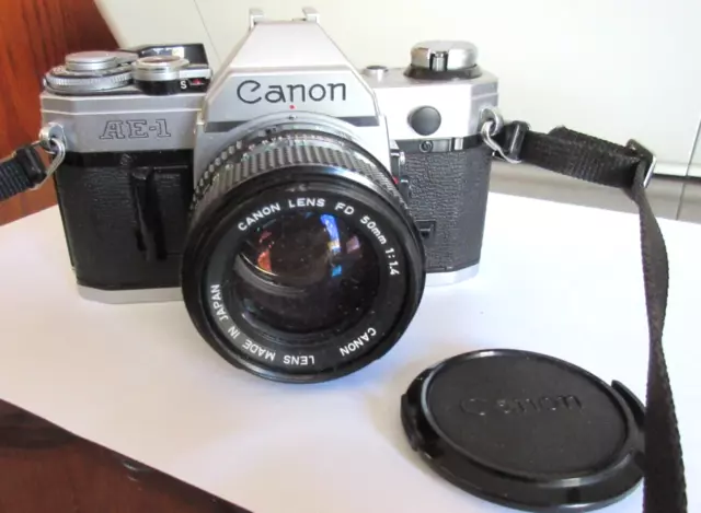 Cámara fotográfica Canon AE-1 35 mm SLR con lente Canon FD 50 mm F1.4 + correa BONITA CÁMARA
