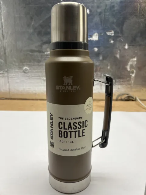 https://www.picclickimg.com/9ZUAAOSwBOdlSuyx/Stanley-Classic-Legendary-Vacuum-Insulated-Bottle-Cocoa-Praline.webp