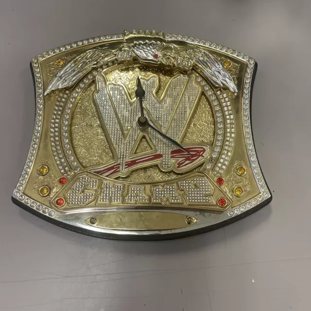 wwe deluxe classic superstars spinner championship belt wall clock