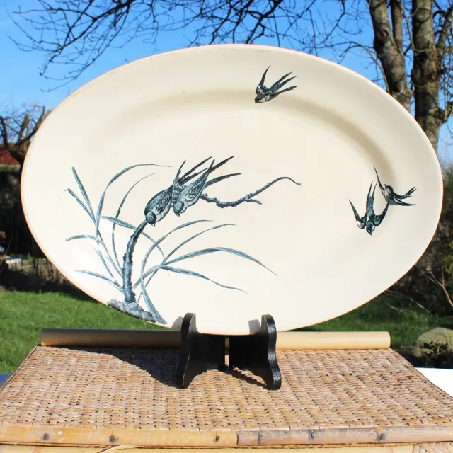 Grand plat ovale en faïence de Longwy modèle Japonais décor oiseaux Hirondelles