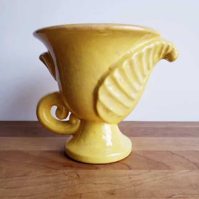 Gonder Pottery urn vase with leaf golden yellow and terra cotta pink glaze