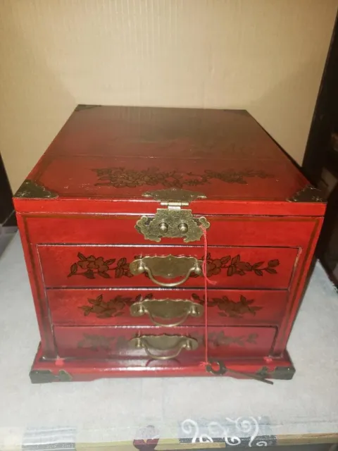 vintage red lacquer chinese jewelry box with drawer and  fold away mirror.