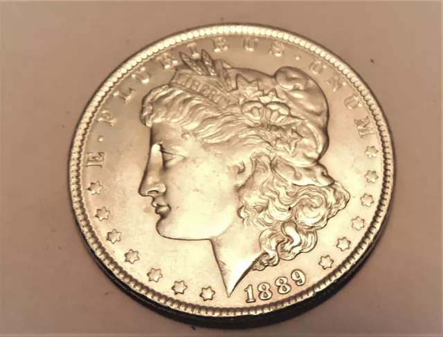 1889- p, morgan silver dollar, bu