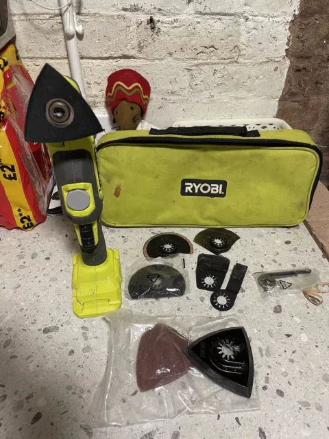 ryobi 18v multi tool in case with blades