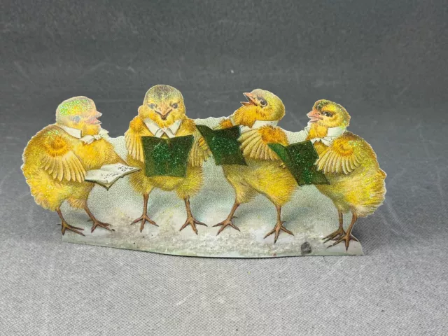 Oster Easter Aufsteller Osteraufsteller Pappe Glitzer Küken Musik 11cm