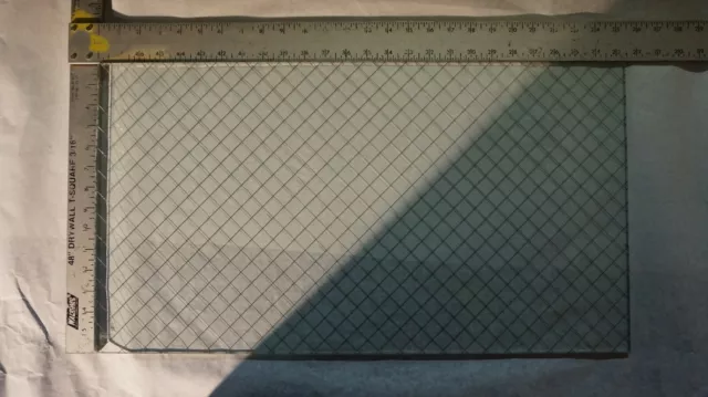 13 7/8in W x 25 3/8in L x 1/4in Thick. 3/4in Diagonal Wired Fire/Safety Glass