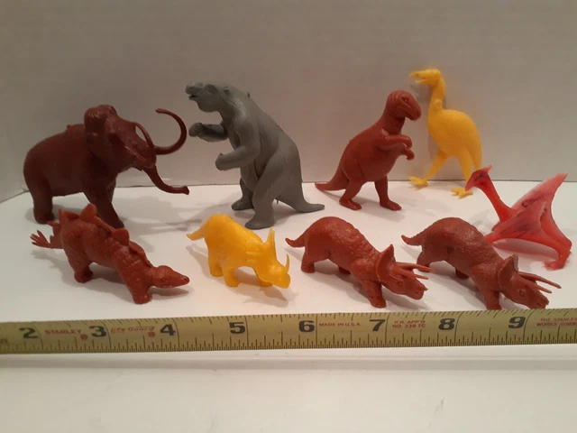 LOT OF 9 TOY DINOSAURS FROM MARX and MPC includes WOOLY MAMMOTH