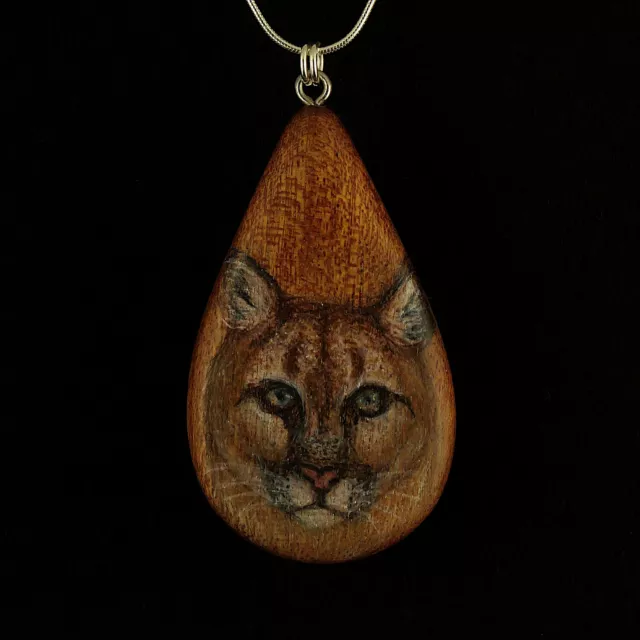 Cougar on Sappel Ribbon Wood Pendant