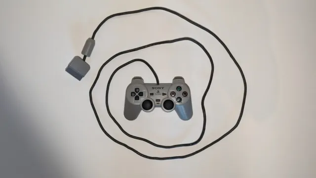 Official 1997 Sony PlayStation Dual Analog Controller (Grey)