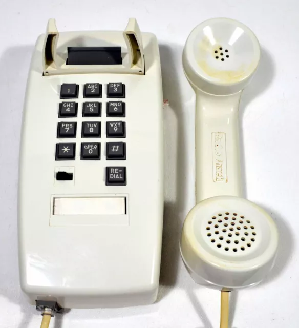 White Radio Shack Wall Phone - with a Tone/Pulse switch, and Loud adjustment