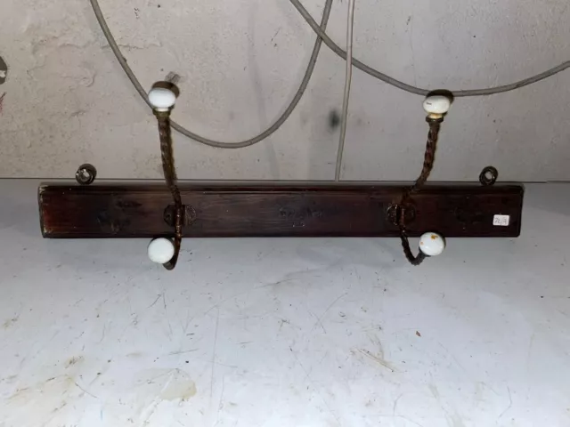 Antico appendiabiti da parete in legno
