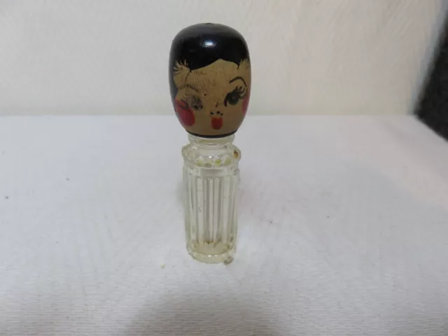 Vintage perfume with wood head  glass figural bottle       ships USPS for USA