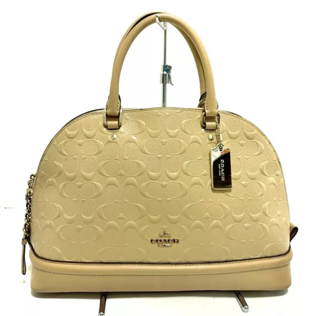 Beige patent leather purse discount