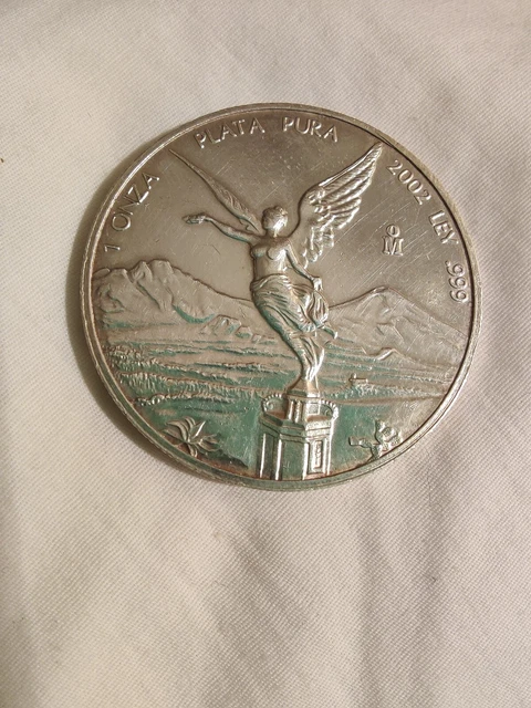 2002 1 OZ Silver Mexican Libertad proof coin Mintage of only 850,000 world wide.