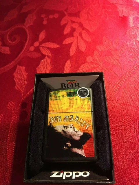 Brand new "BOB MARLEY GUITAR" ZIPPO LIGHTER DATED 2012 with free flints