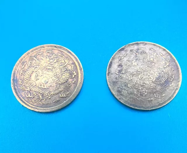 lot of 2 little China Chinese coins dragon