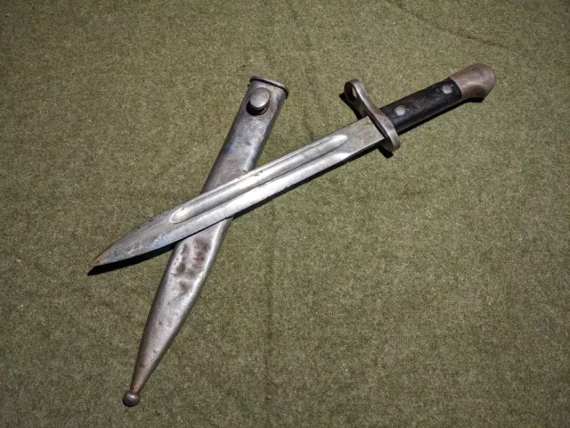 Turkish model 1935 Mauser bayonet Dark wood and scabbard. Marked ASFA 1938