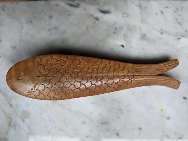 Vintage wooden fish shaped nut cracker 8" long