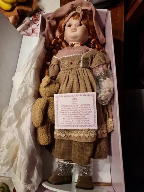 Vintage Porcelain doll the Leonardo Collection. NEVER BEEN TAKEN OUT OF THE BOX