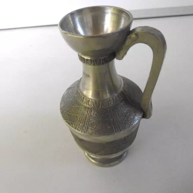 small TP tin pitcher