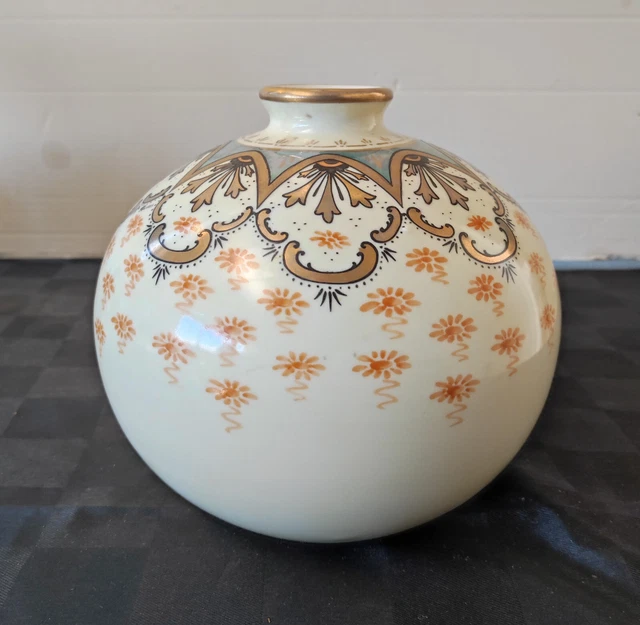 Vase boule porcelaine de Limoges signé paillez