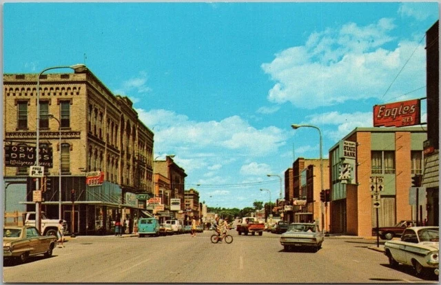 Crookston, Minnesota Postcard Downtown Street Scene / Stores 1960s Cars - Unused