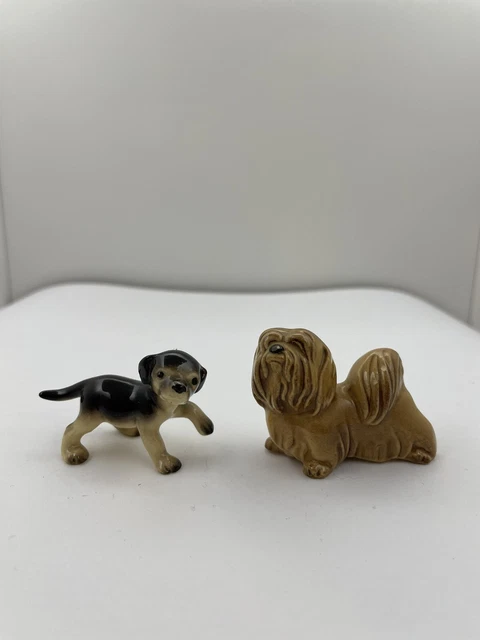 Two (2) Vintage Porcelain dog or puppy figurines.  Great condition. 