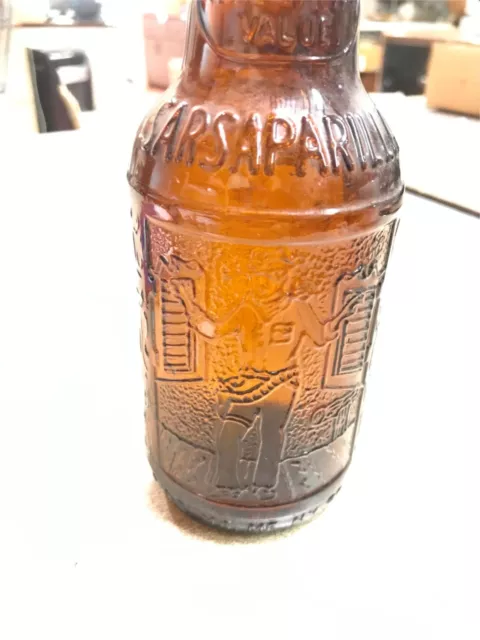 Vtg Brown Amber Glass Soda Bottle Sarsaparilla Sioux City Cowboy picture