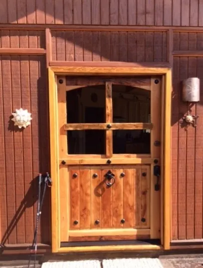 Rustic reclaimed lumber glass Dutch door solid wood story book castle winery