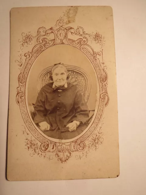 Mrs. Rötts? as an old woman with hood in the basket chair - approx. 1860/70s / CDV