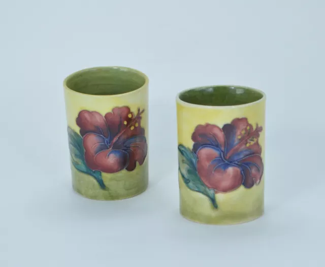 William Moorcroft pair of 'Hibiscus' pattern spill vases 6.3cm c.1918-1929