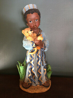 African Boy Figurine With Lion Cub Colorful Tribal Costume