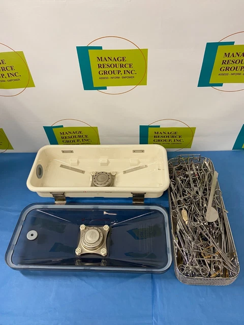 Symmetry 9040 Flashpak with miscellaneous used surgical instruments