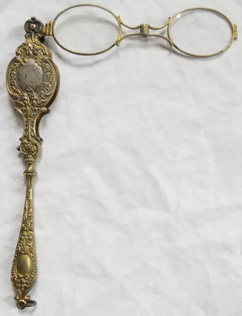 Anteojos plegables Repousse de plata lorgnette antiguos de colección