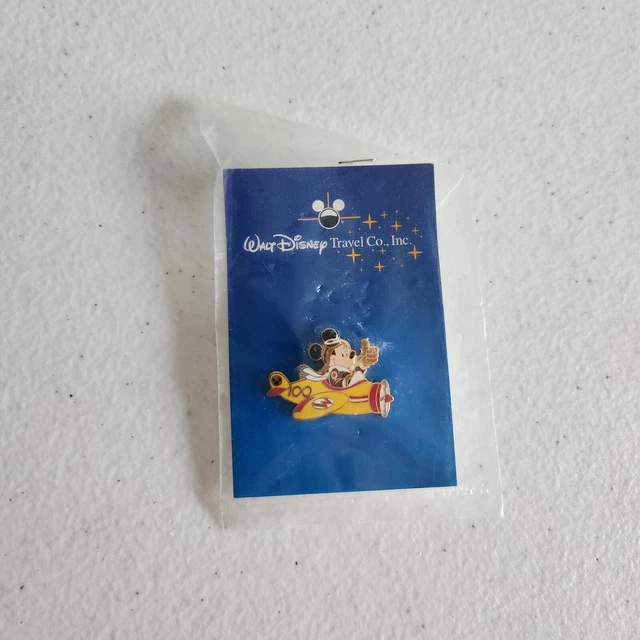 WALT DISNEY TRAVEL Co Inc 100 Year Mickey Mouse Flying Plane Trading