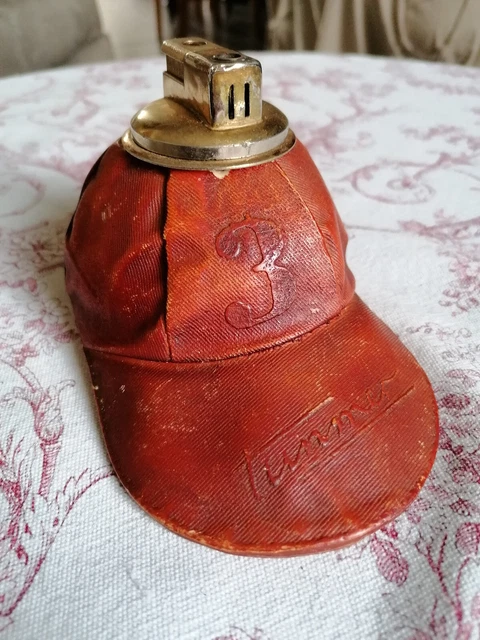 briquet de table vintage gaz en forme de casquette signé tunmer marque CHAMP