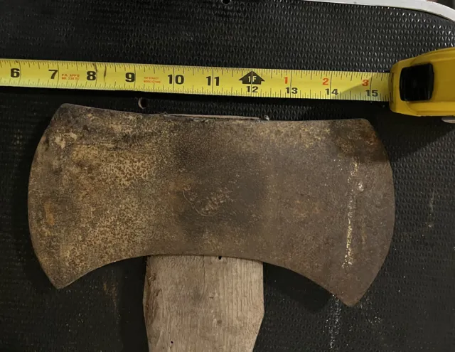 Double bit axe with cant read mark but has certain outline
