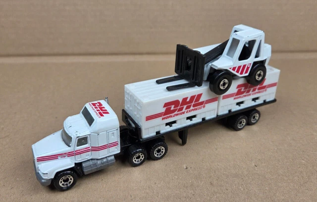MATCHBOX TEAM CONVOY Mack CH600 DHL Container truck LKW Fork Lift weiß ...