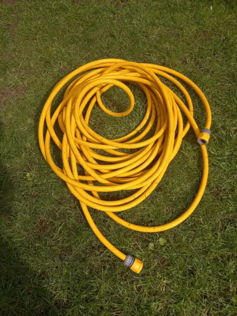 Heavy Duty Yellow Garden Hose. Used Item But In Working Order. 27 Meters Long.