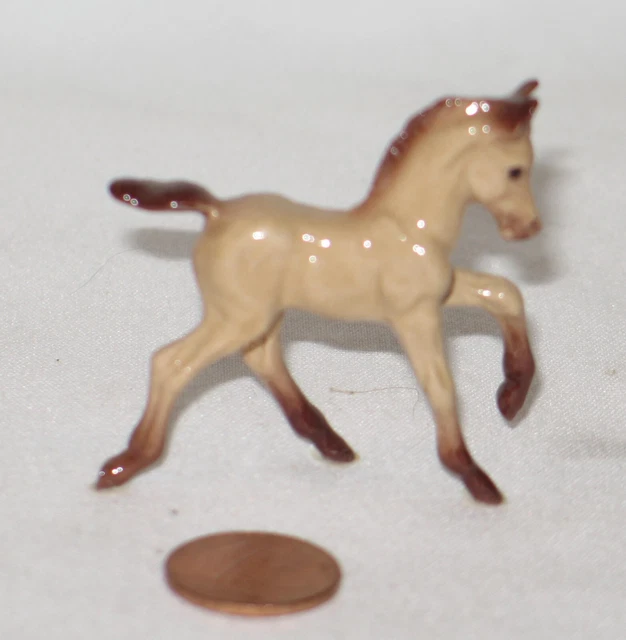 hagen renaker trotting buckskin foal horse