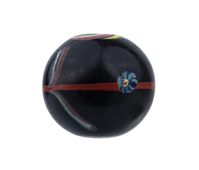 An Antique Japanese Ebonized Rainbow Swirl Decorated Glass Ojime Bead