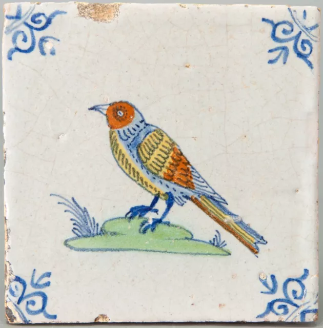 Nice Dutch Delft polychrome tile, bird, mid 17th. century.