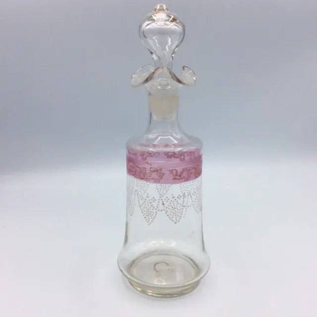 Carafe à liqueur en verre soufflé teinté émaillé à décor géométrique début XXème